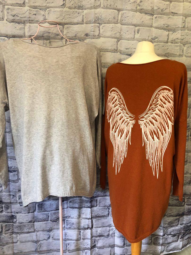 Longer Length Knit With Angel Wing Design